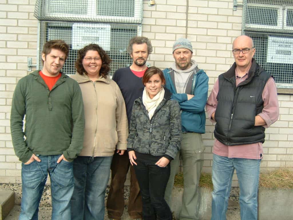 Some of the production crew standing outside the on-site production office in the H-Blocks.